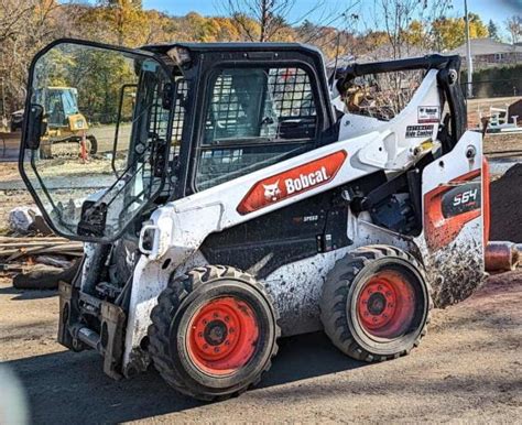 whats a lot of hours on a skid steer|what does a bobcat cost.